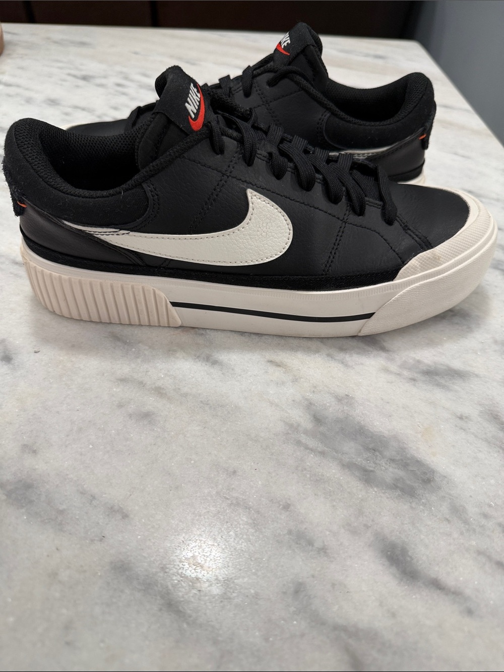 Nike Women's Black Casual Sneakers with White Swoosh